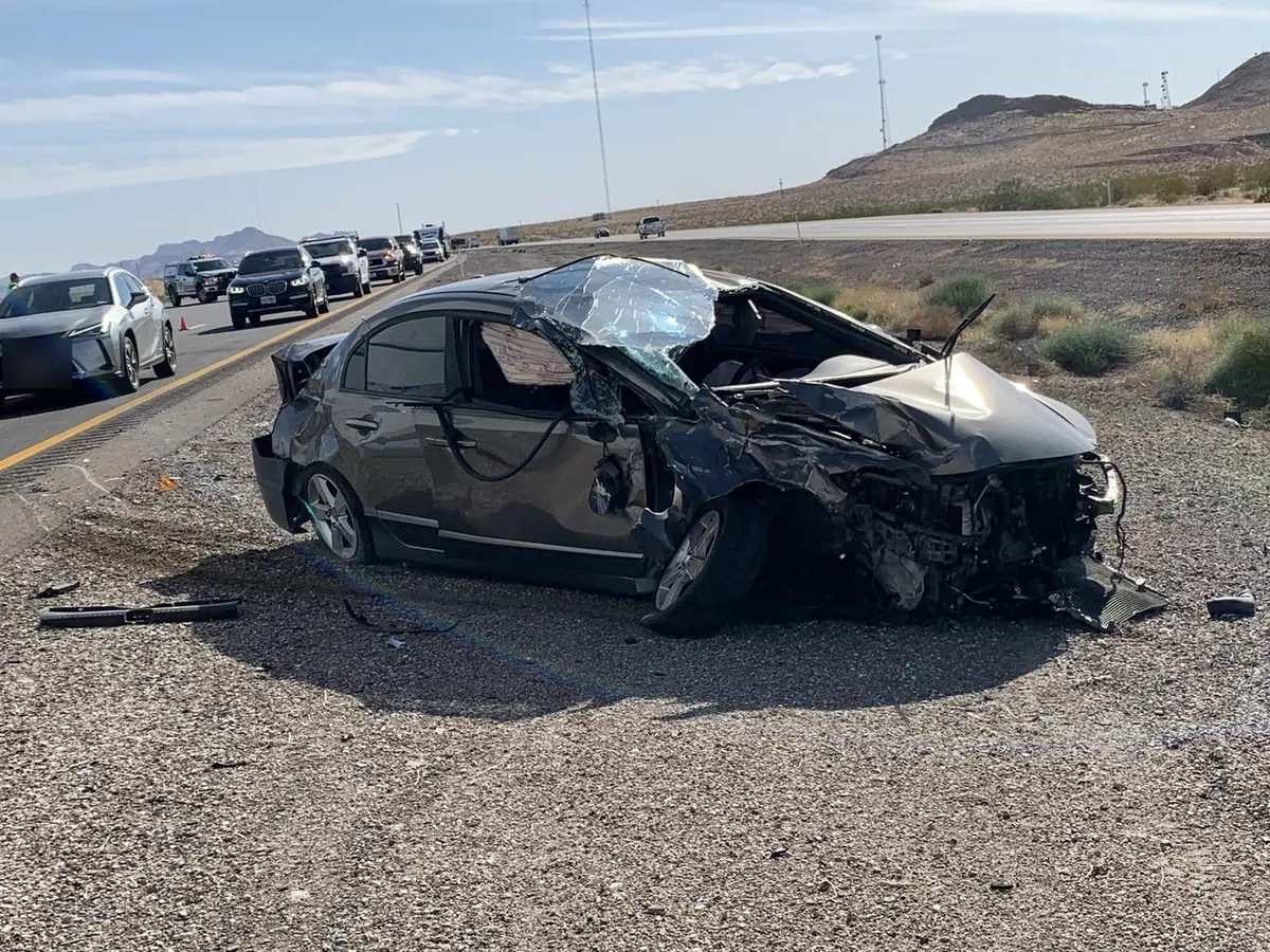 Rollover on the highway shoulder.