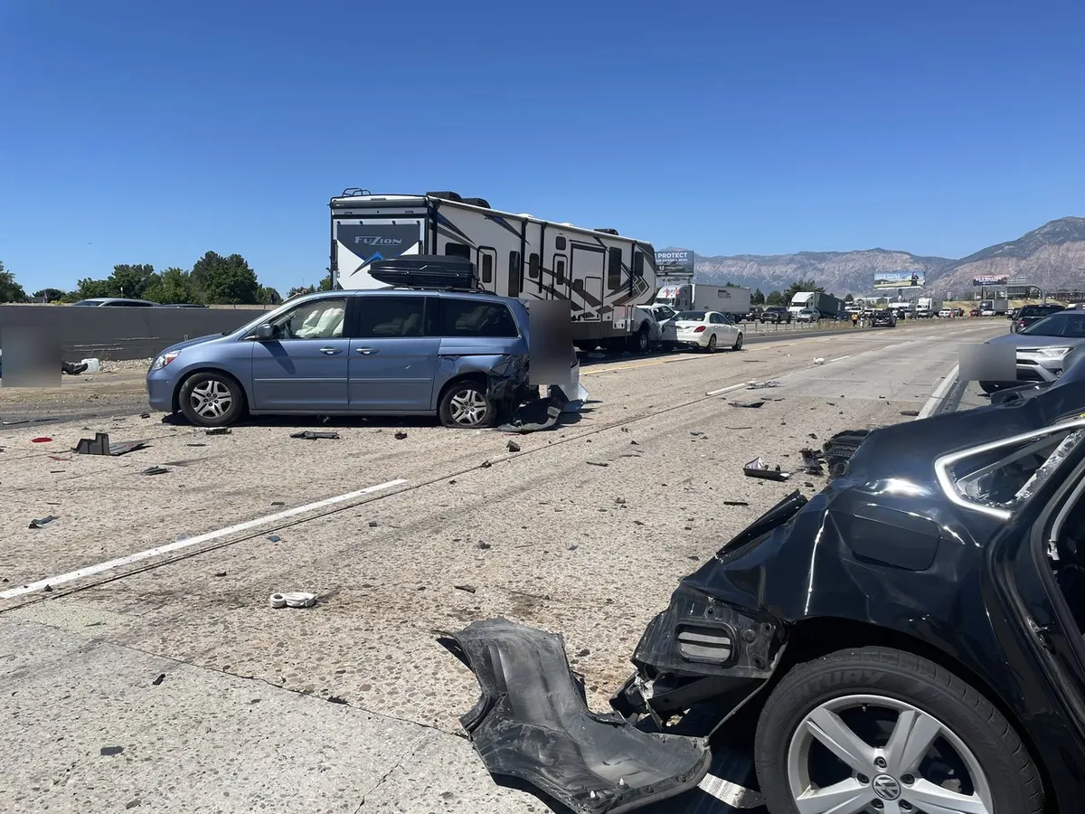 Multi-vehicle pileup behind an RV.