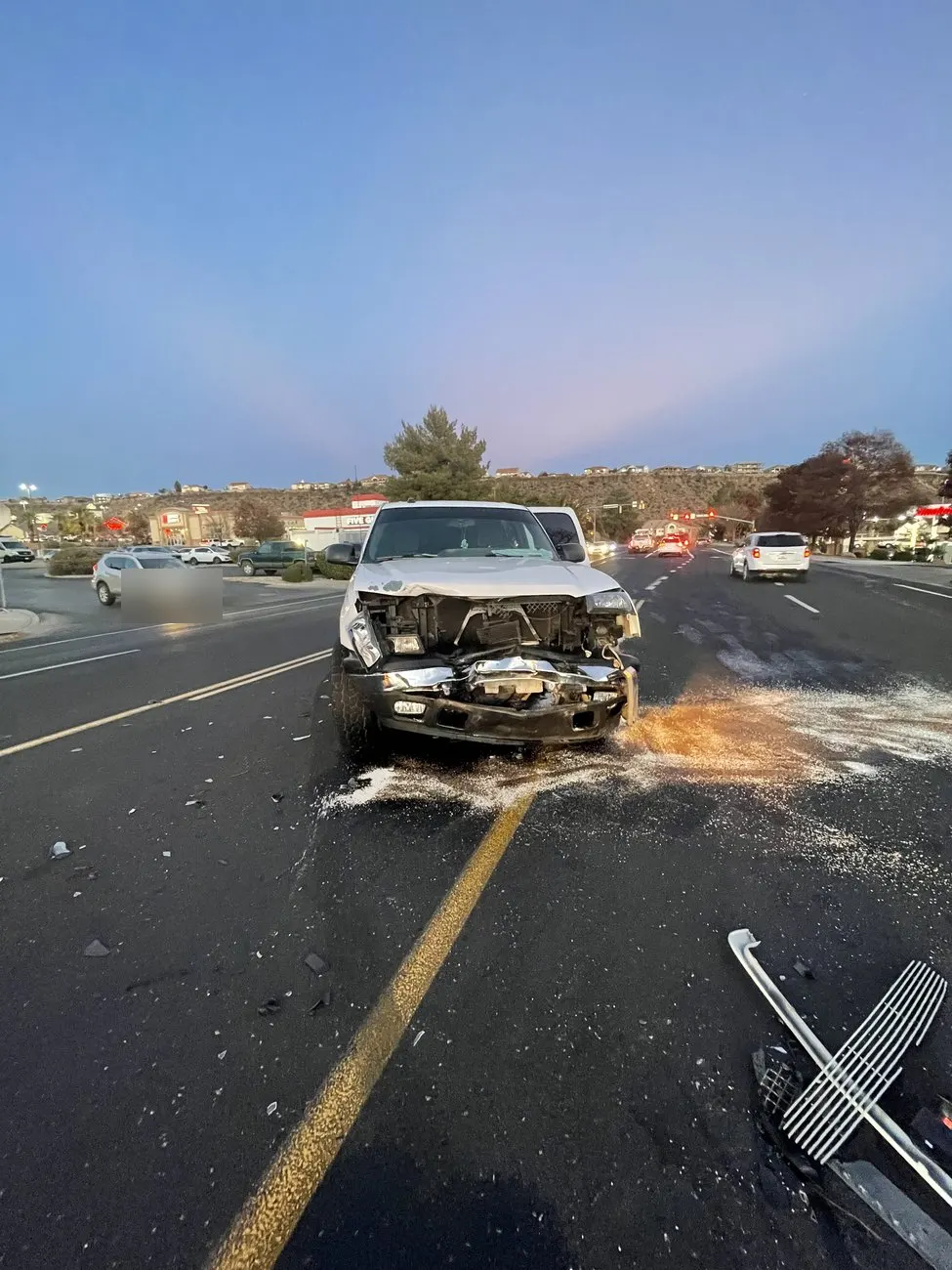 Left-turn collision at a busy intersection.